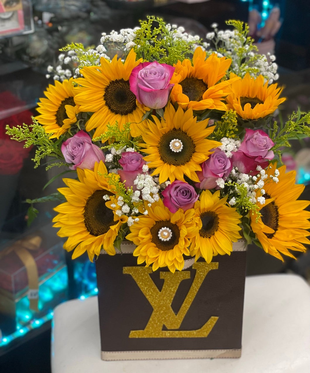 LV box or channel with roses and sunflowers